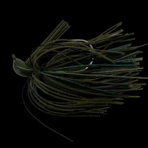 An olive green soft plastic fishing lure with a wide skirt made of dark strands and subtle teal-green glitter, shown against a solid black background.